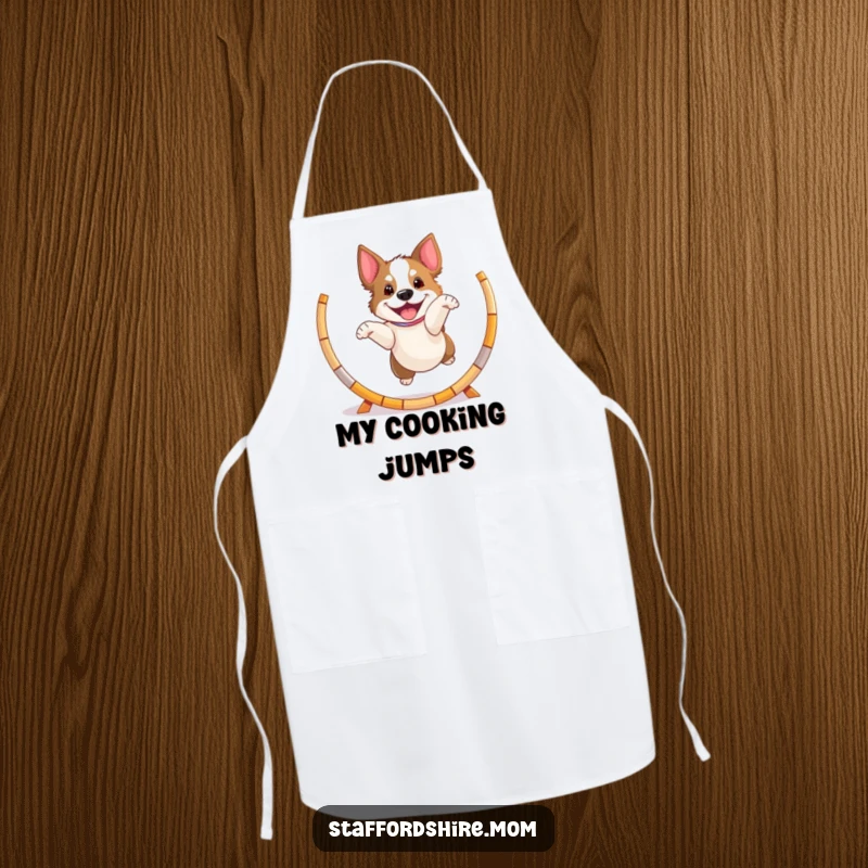Funny playful Staffordshire dog apron, jumping through a hoop, energetic and humorous kitchen wear.