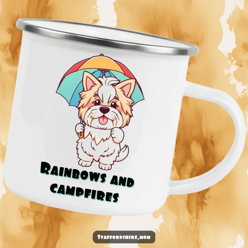 Funny camping mug featuring a friendly Staffordshire dog waving hello while holding a colorful rainbow umbrella, ideal for outdoor enthusiasts.