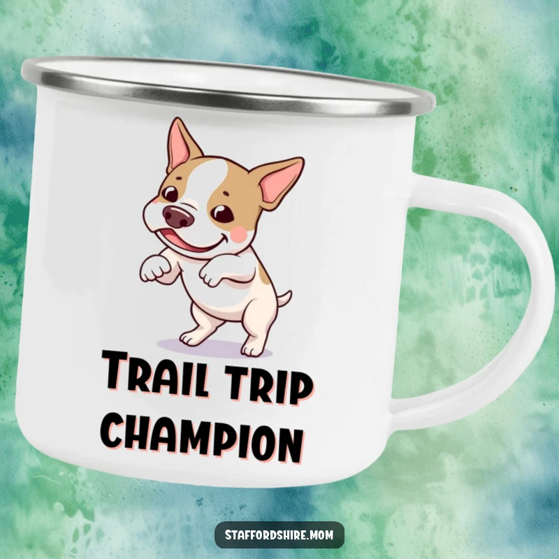 Funny Staffordshire bull terrier camping mug showing a dog playfully tripping over its feet with a thoroughly amused expression.