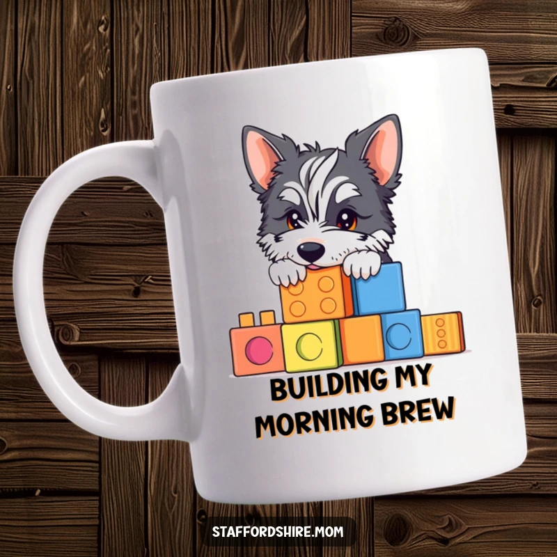 Funny Staffordshire mug with a happy dog peeking over colorful building blocks, embodying playful curiosity.