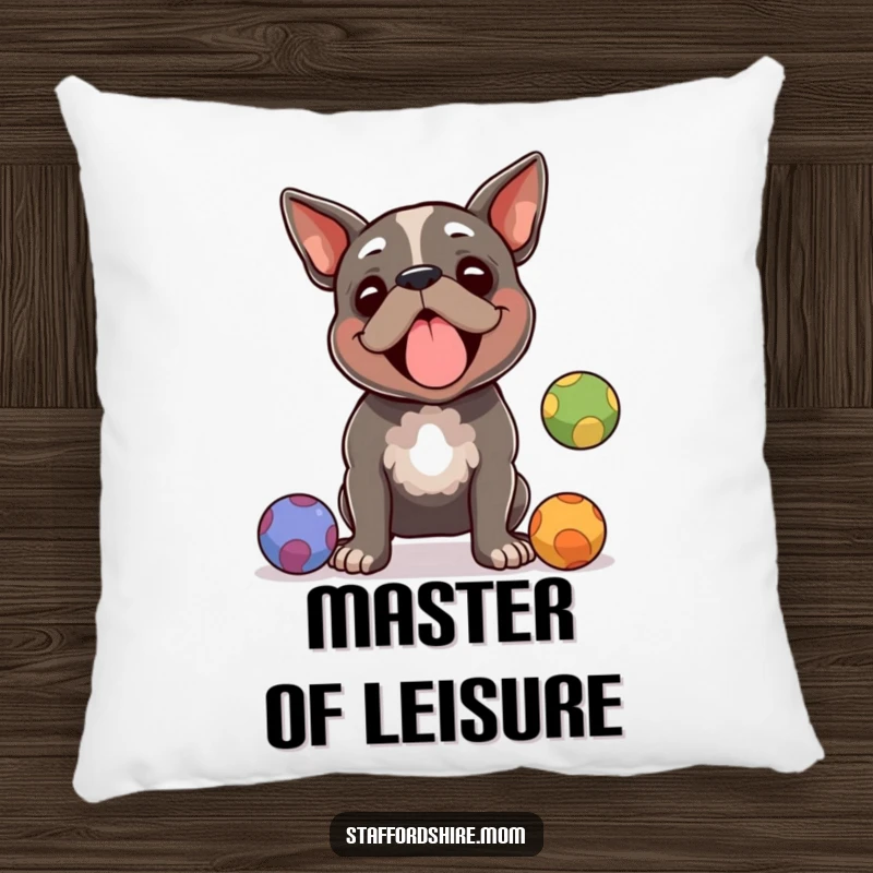 Funny Staffordshire terrier pillow, a dog juggling balls with amused focus, perfect for comfort and as a funny gift.