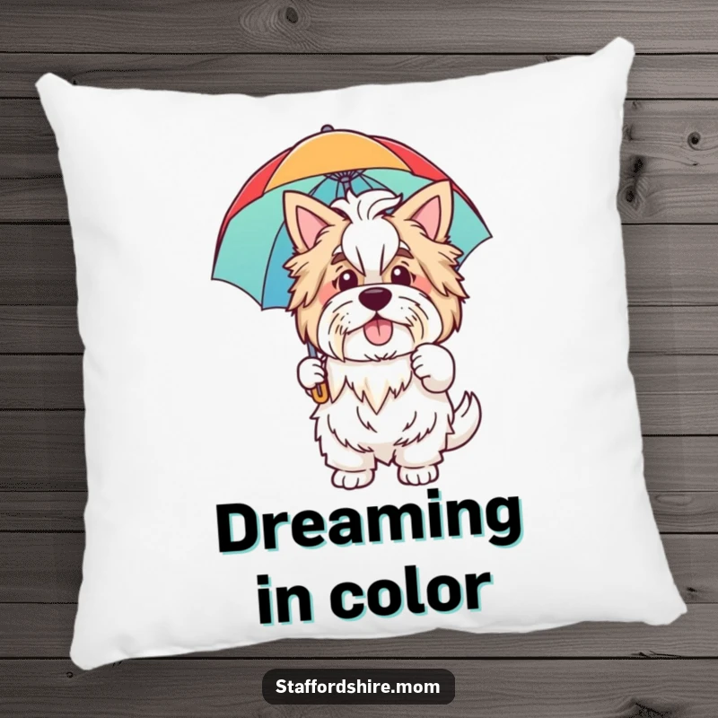 Funny pillow featuring a friendly Staffordshire dog waving hello while holding a colorful rainbow umbrella, adding comfort and cheer.