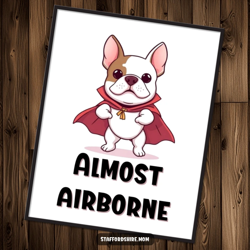 Funny Staffordshire Bull Terrier poster depicting a dog wearing a cape, leaping as if flying, embodying a humorous superhero spirit.