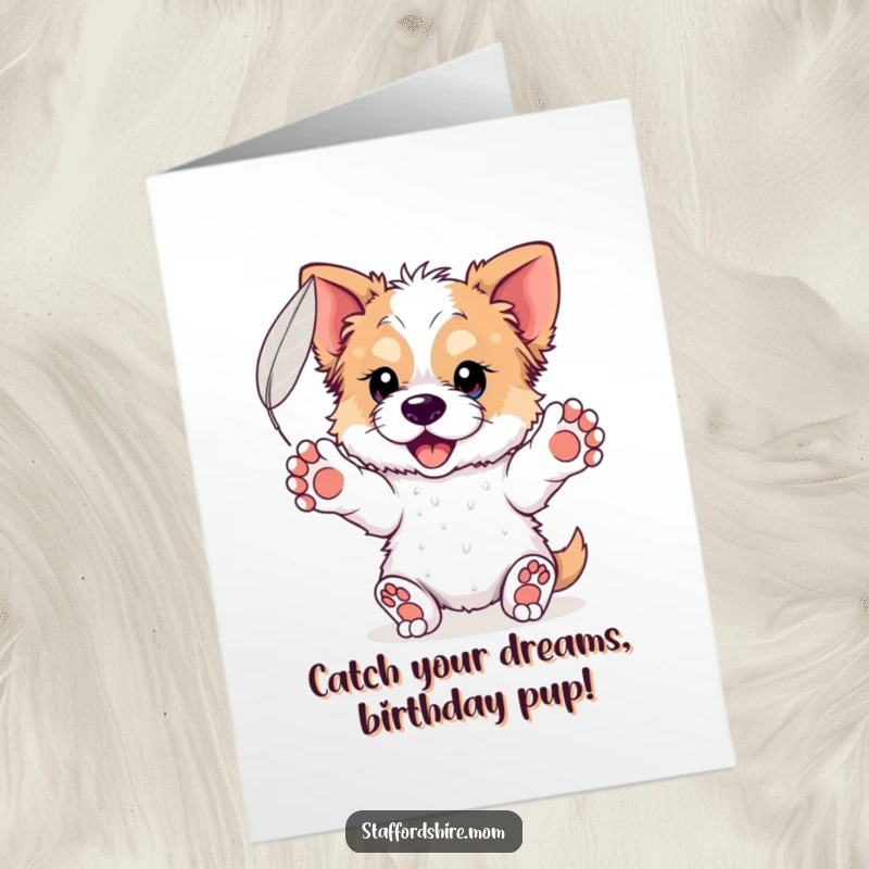 Funny Free Printable Birthday Card: Staffordshire dog with outstretched paws catching a delicate floating feather, a gentle downloadable.