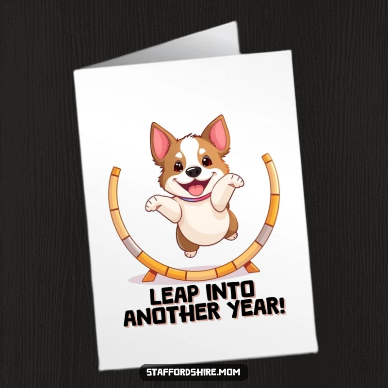 Free Printable Birthday Card featuring a playful Staffordshire dog leaping excitedly through a hoop, full of energy and fun.