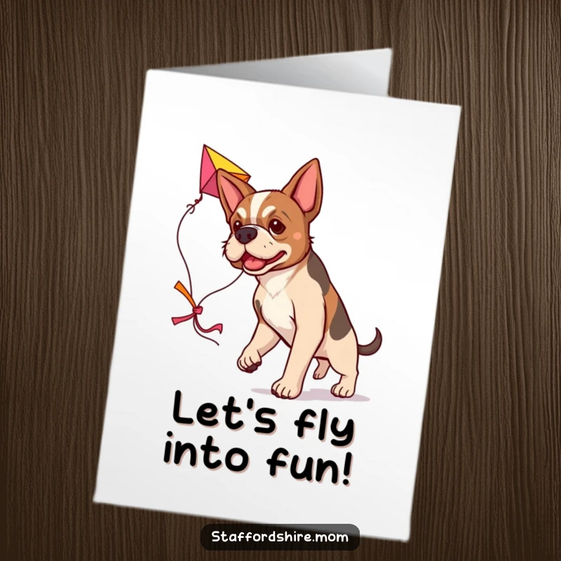 Free Printable Birthday Card featuring a determined Staffordshire dog happily carrying a large, colorful kite, ready for fun.
