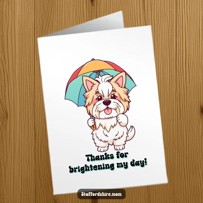 Funny Free Printable Thank You Card: A friendly Staffordshire waves, holding a colorful rainbow umbrella, a cheerful way to say thanks.