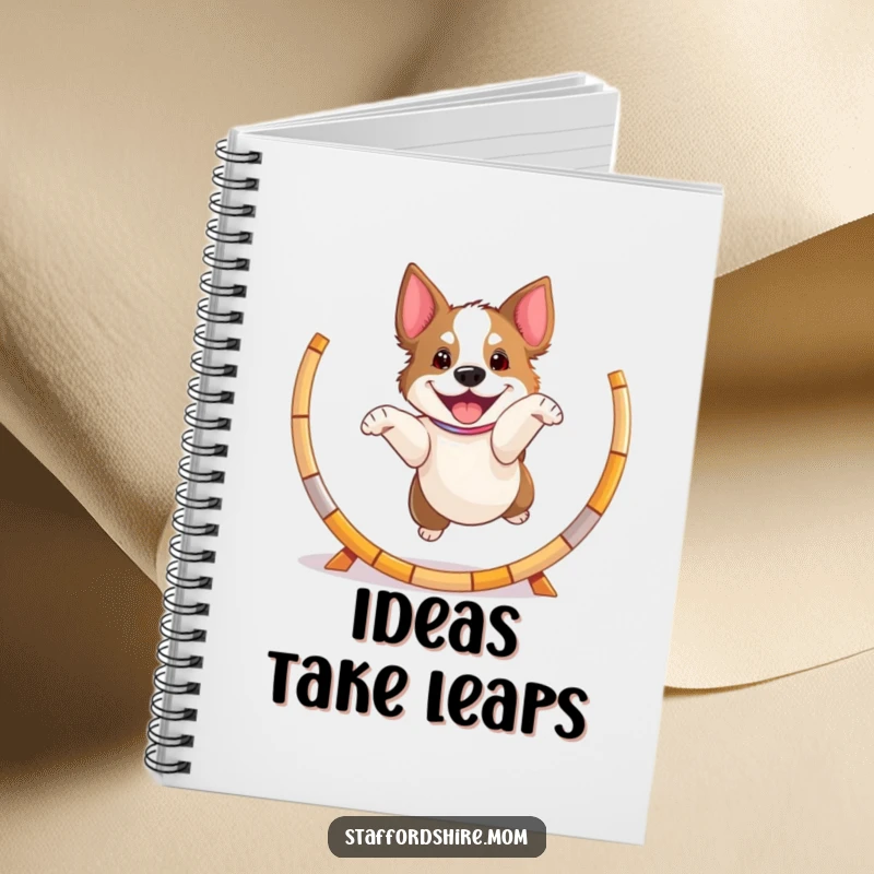 Funny playful Staffordshire dog notebook, jumping through a hoop, energetic and humorous stationery.