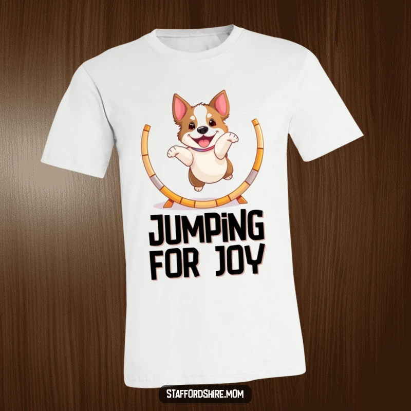 Funny playful Staffordshire dog t-shirt, jumping through a hoop with excitement, energetic and humorous graphic.