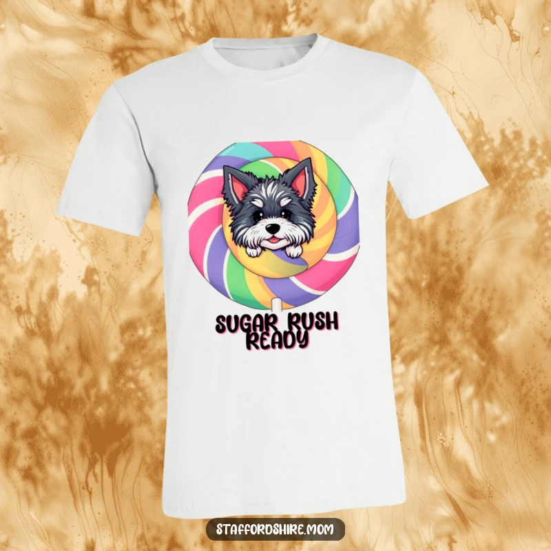 Funny Staffordshire Lollipop T-Shirt: Features a cute dog character playfully peeking out from behind a large, colorful lollipop.