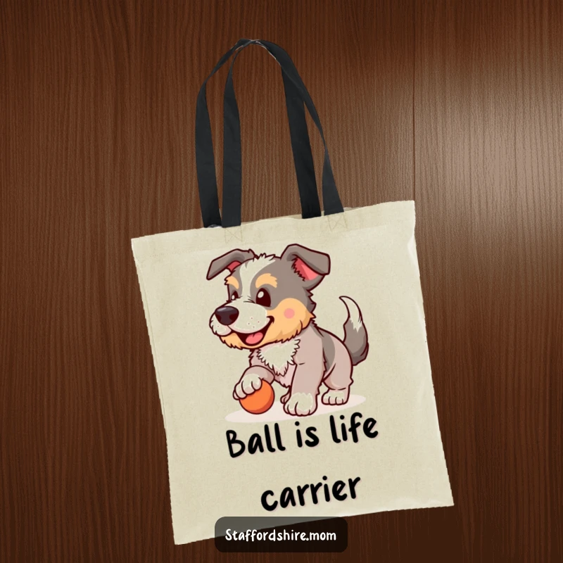 Funny Staffordshire tote bag, dog enthusiastically playing fetch, wagging tail, reusable shopping bag, humorous pet accessory, ideal funny gift.