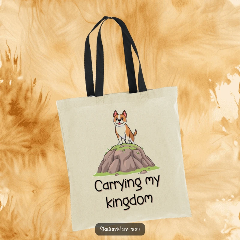 Funny Tote Bag showcasing a brave Staffordshire dog perched atop a small hill, perfect for stylish and humorous everyday use.