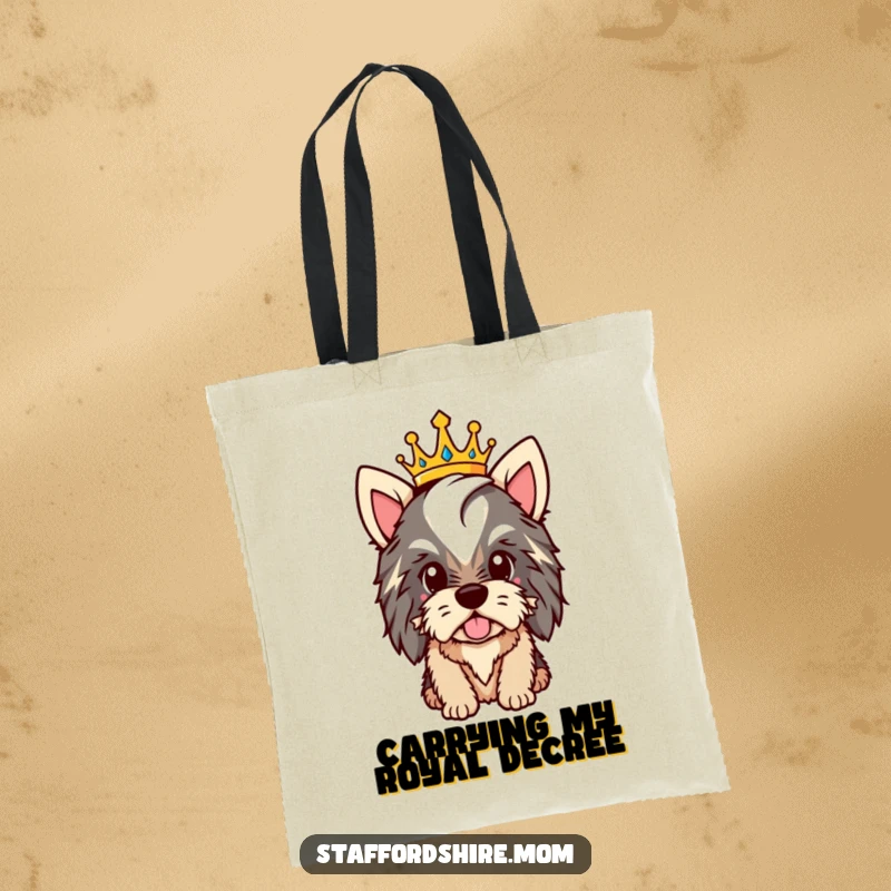 Funny Staffy tote bag with a proud dog wearing a crown, great for carrying essentials with royal flair.