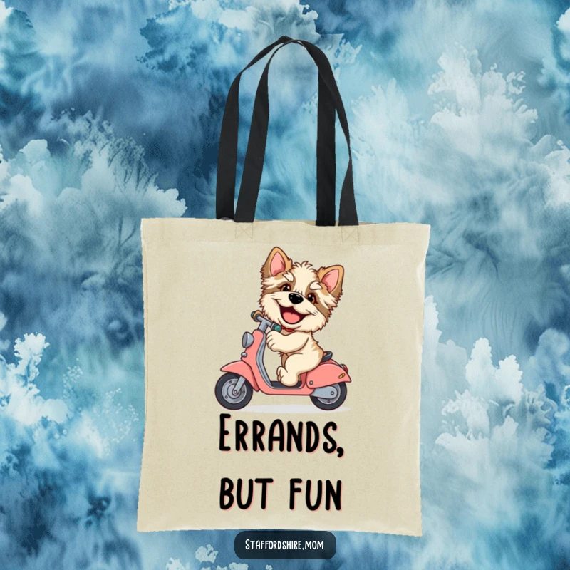 Funny Staffordshire tote bag, giggling dog, riding scooter, large paws, humorous accessory, ideal funny gift.